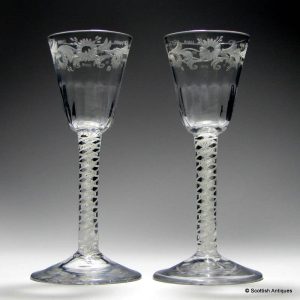 A Pair of Rococo Engraved Georgian Opaque Twist Wine Glasses c1760