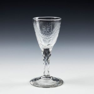 A Neoclassical Engraved Facet Cut Stem Wine Glass c1775