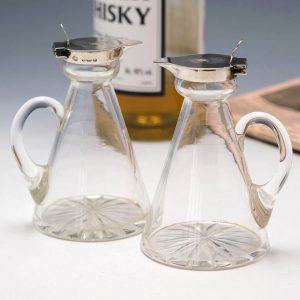 Pair of Silver Mounted Hukin & Heath Whisky Noggins Birmingham 1921