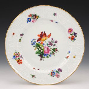 A Meissen Porcelain Plate with Moulded Border c1870