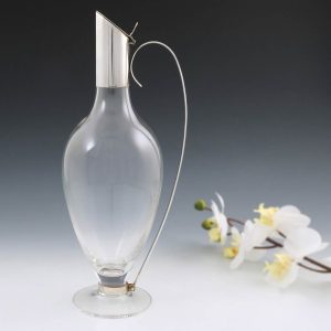 A Hallmarked Silver Mounted Dartington Claret Jug