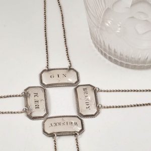 Set of Four Sterling Silver Decanter Labels 1865