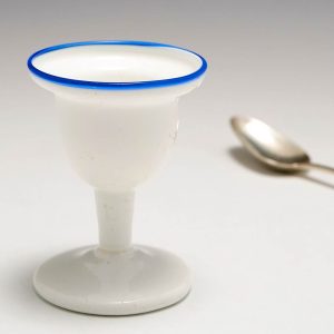Opaque White Glass Egg Cup With Trailed Blue Rim c1800