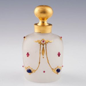 A French Opaque Glass & Gilt Perfume Bottle with Cabachons. 1860-80