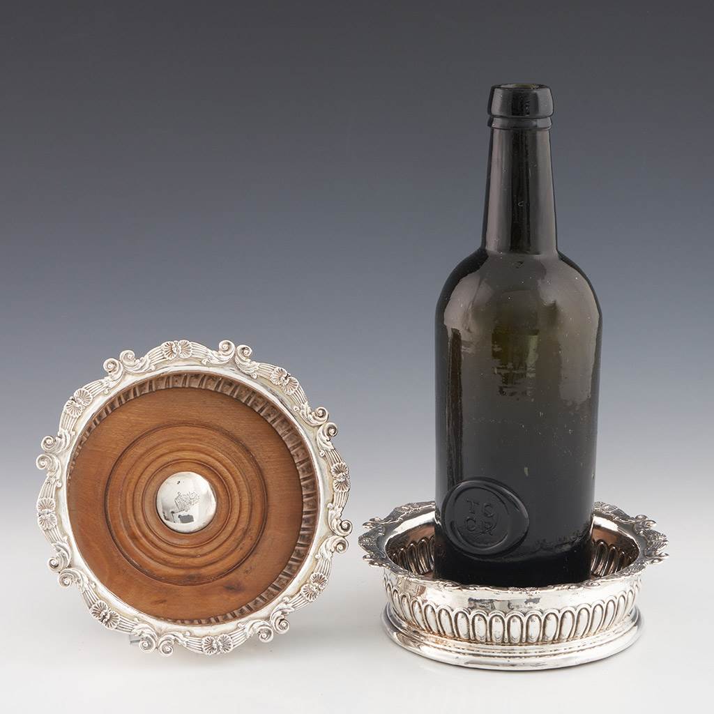 A Pair of Silver Wine Coasters