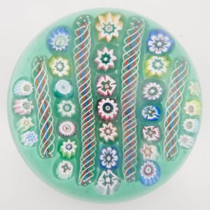 A John Deacons Linear Latticino Twist and Millefiori Paperweight c2000