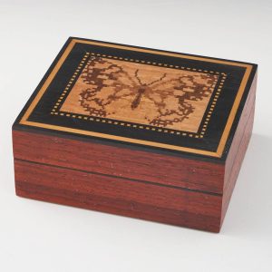 A Jewellery Box With Tesserae Marbled White By Robert Vorley