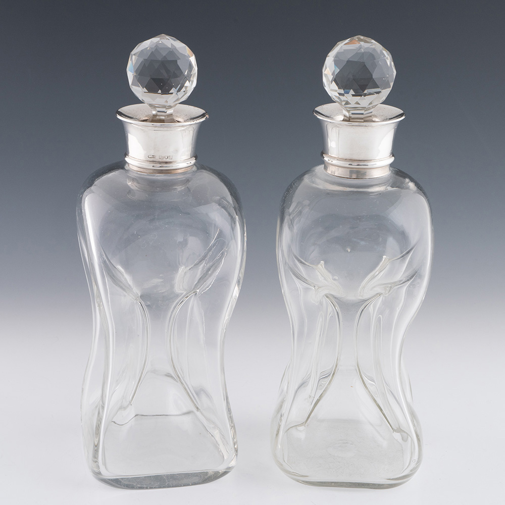 Pair of Scrooge Decanters with Silver Collars