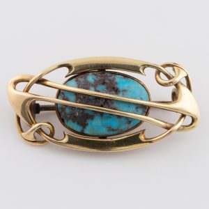 Gold and Turquoise Brooch Attributed to Archibald Knox C1910